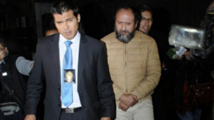 Gustavo Portocarrero, exGerente de Btv luego de ser aprehendido (derecha). Foto: Página Siete