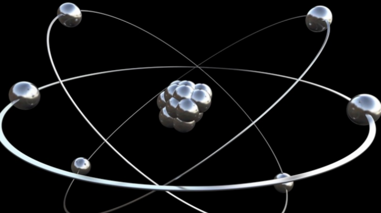 Imagen ilustrativa sobre el núcleo del átomo y los electrones en órbita alrededor.